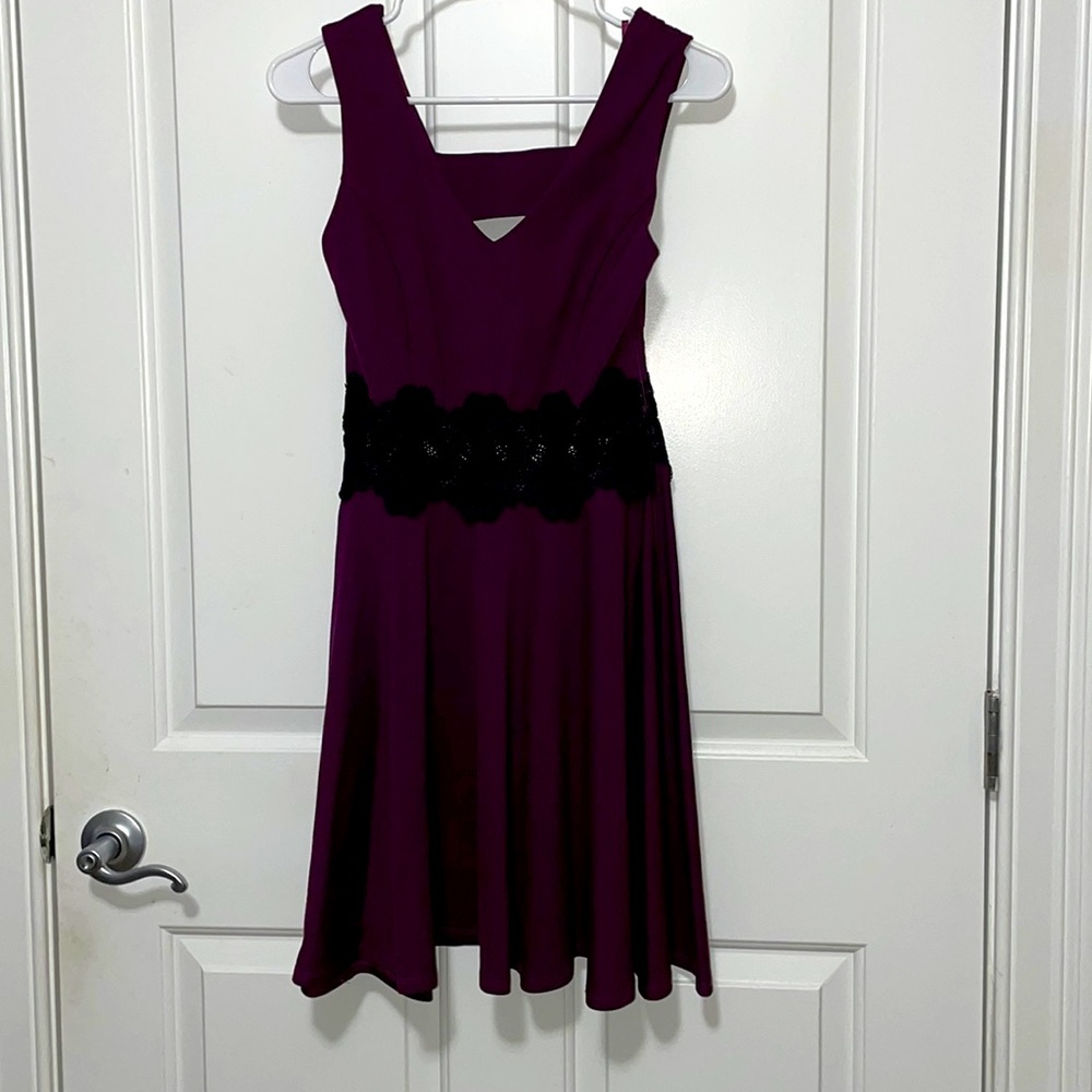 NWT Francesca’s size medium purple/plum dress with cutout